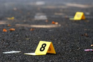 Police evidence markers on the ground
